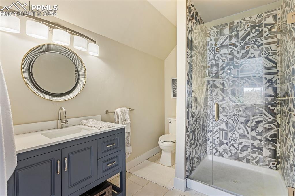 Image 30 of 50: bathroom attached to loft