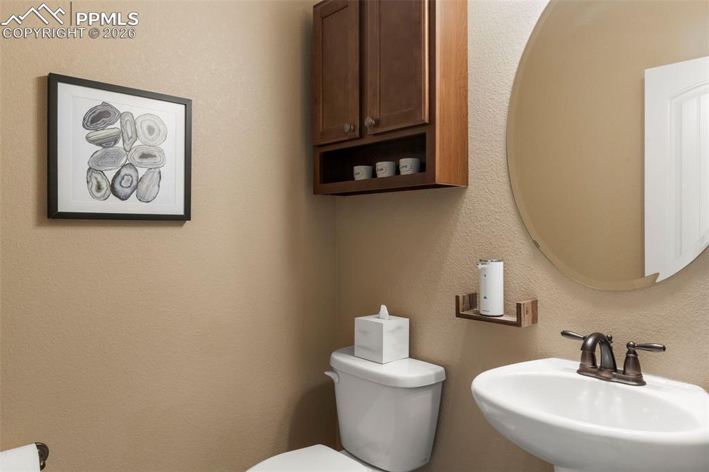 Image 18 of 49: main level bathroom