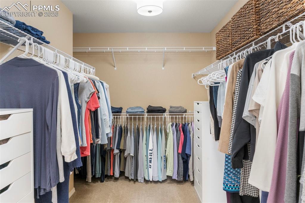 Image 21 of 49: Primary bedroom closet