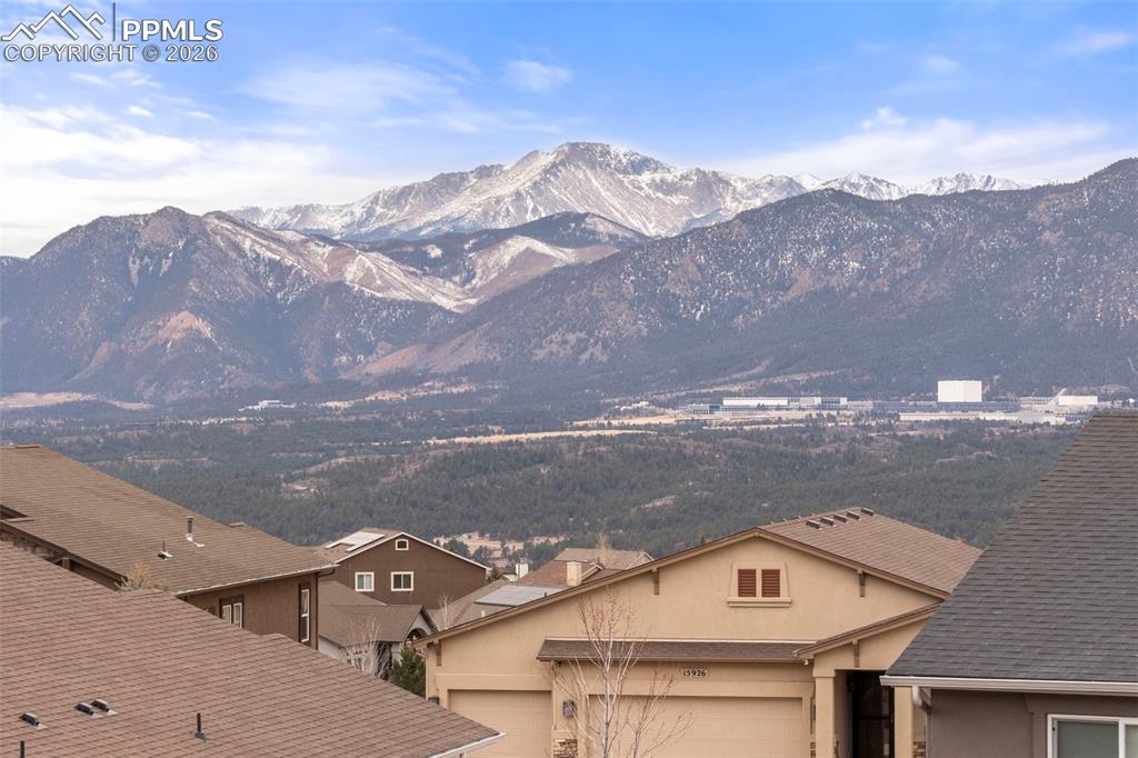 Image 40 of 49: View of Pikes Peak from the top of sitting area in the backyard