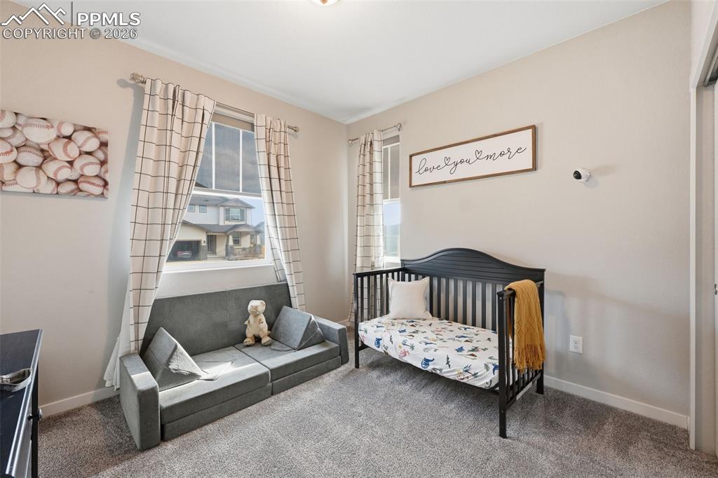 Image 18 of 41: Spacious Bedroom with large windows 