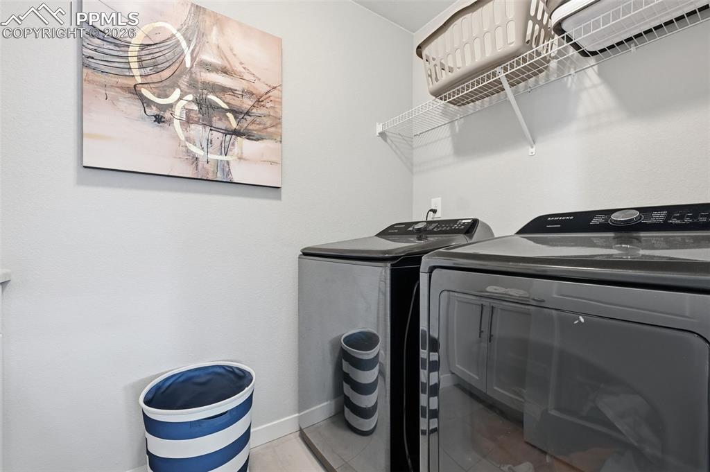 Image 23 of 41: Laundry room on the upper level