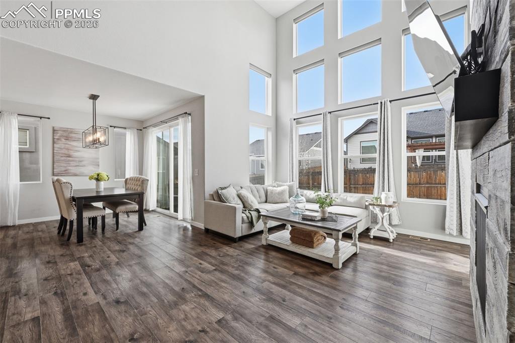 Image 7 of 41: Great room open to kitchen and dining