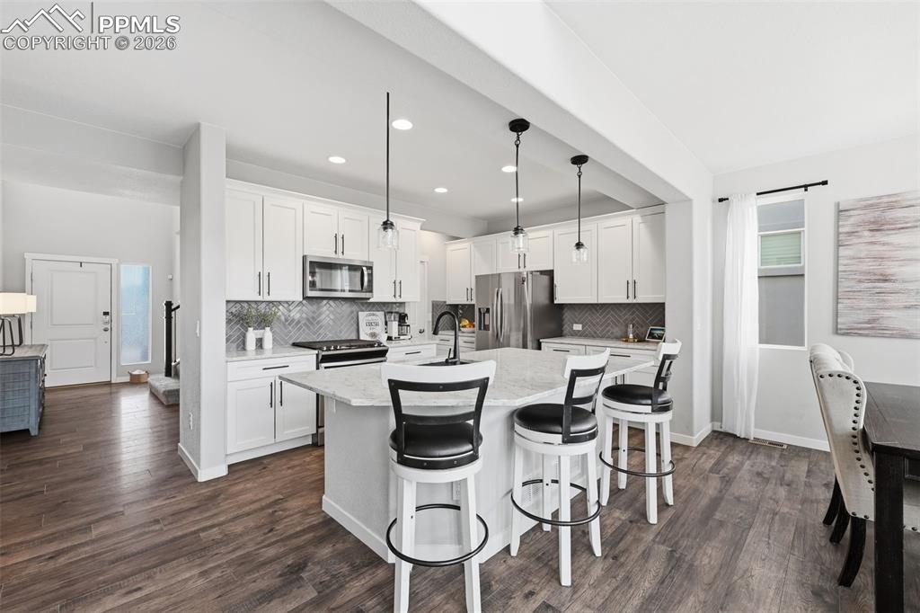 Image 8 of 41: Large kitchen with island