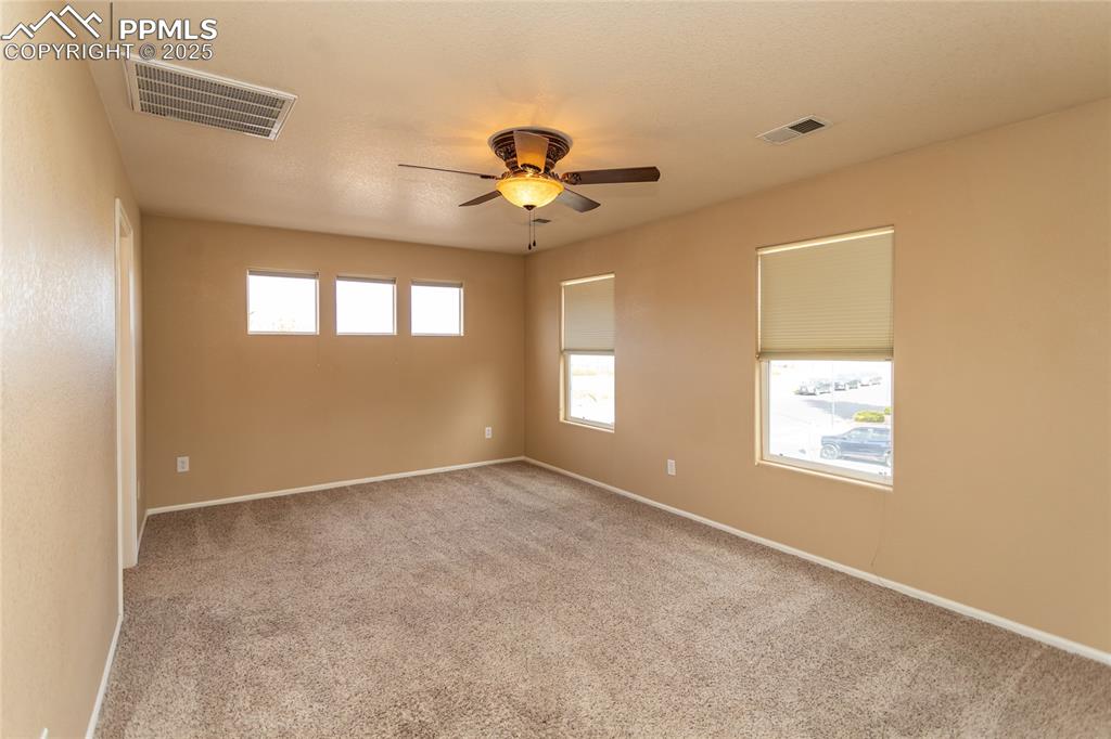 Image 25 of 50: Master Bedroom