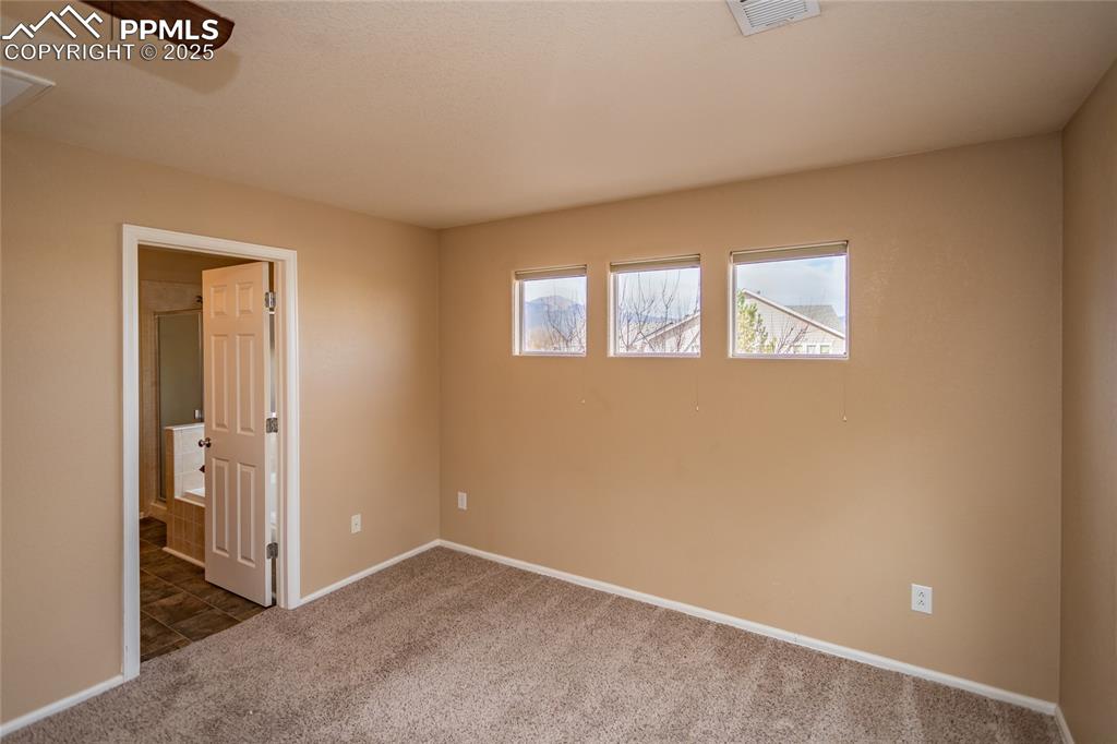 Image 27 of 50: Master Bedroom