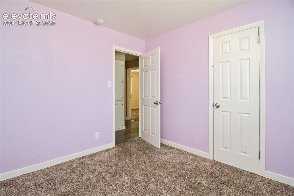 Image 12 of 19: Bedroom