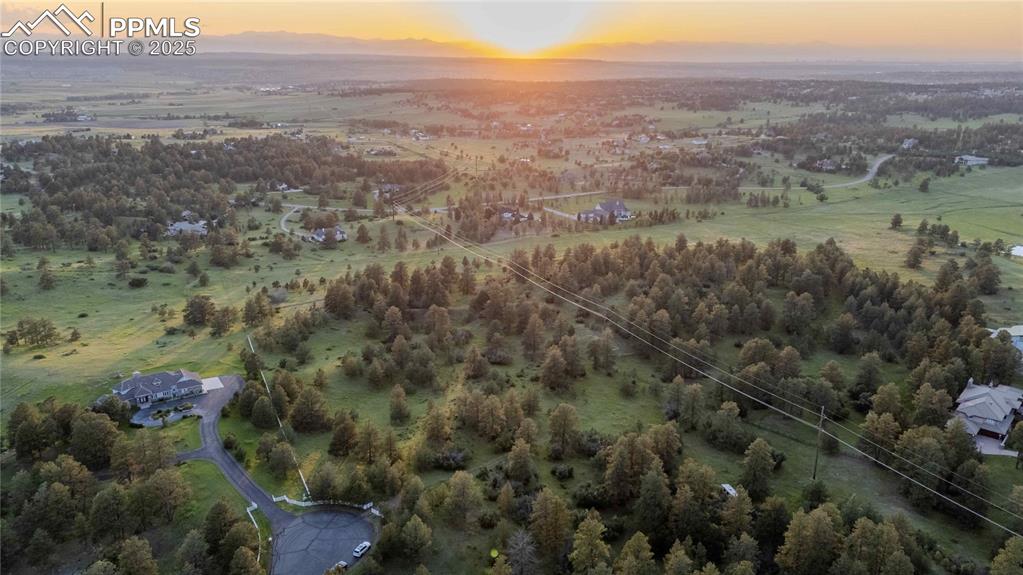 Image 3 of 21: Aerial view at dusk