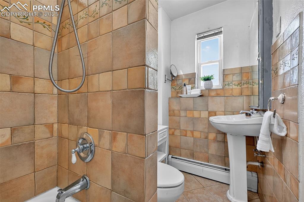 Image 14 of 46: Main Floor Full Bathroom