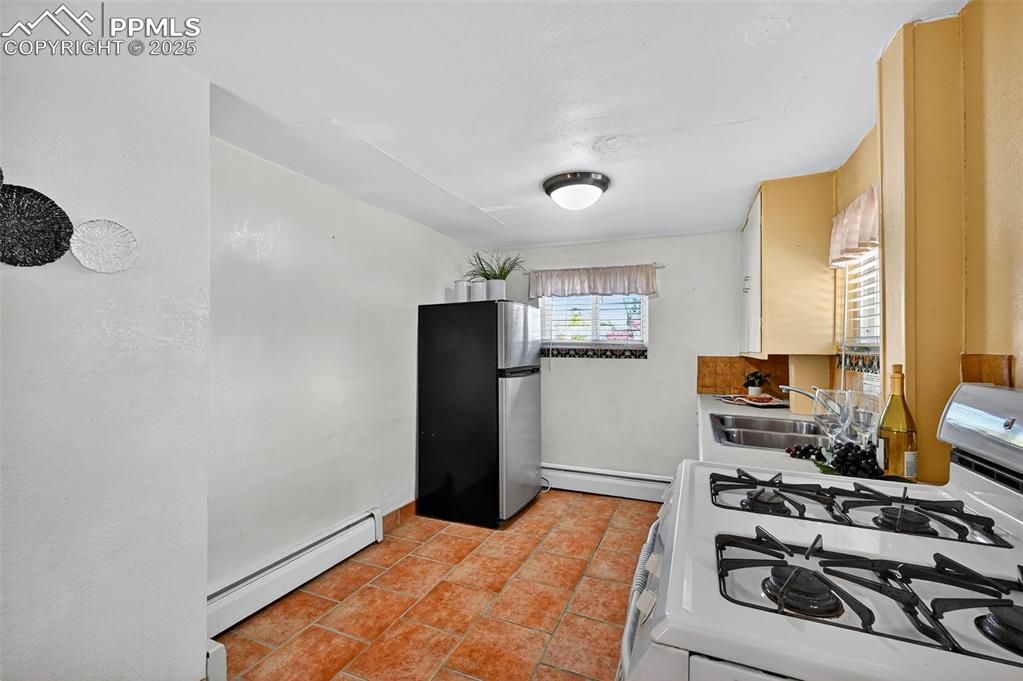 Image 26 of 46: ADU Kitchen Basement