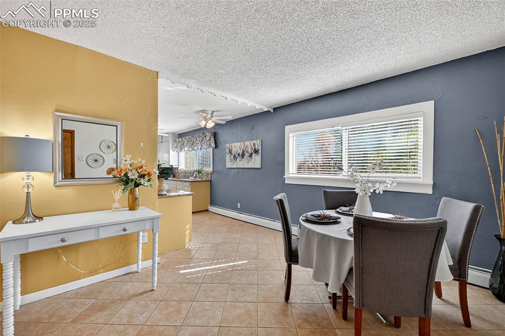 Image 6 of 46: Entry area and dining area