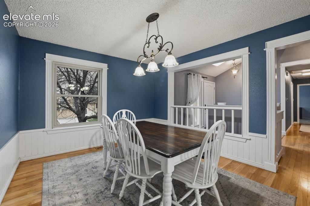 Image 17 of 45: gorgeous wood flooring enhances the room