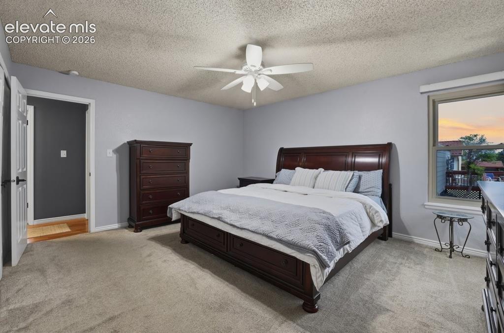 Image 19 of 45: this large bedroom has an adjoining bathroom