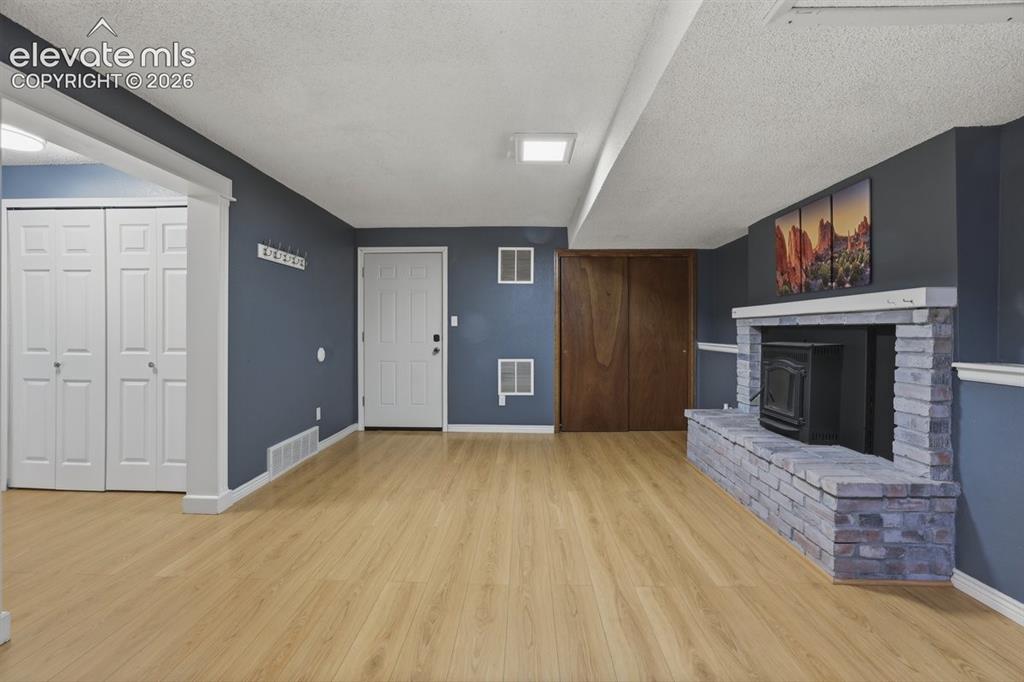 Image 36 of 45: laundry is to the left and garage entrance is straight ahead with mechanica