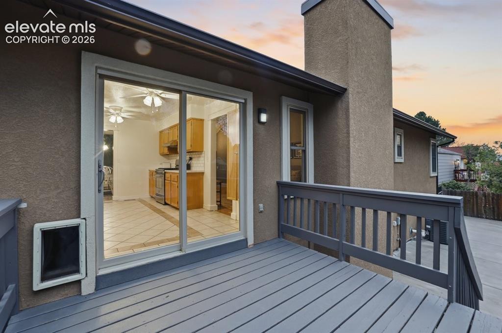 Image 41 of 45: the kitchen has easy access to the backyard which is perfect for entertaini