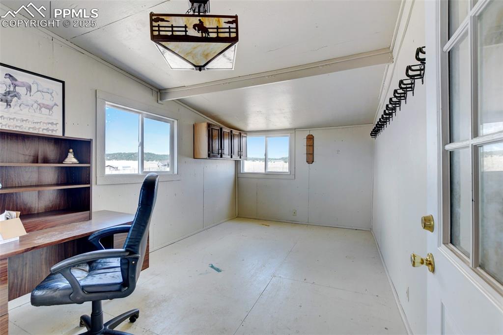 Image 34 of 40: Unfurnished office featuring baseboards
