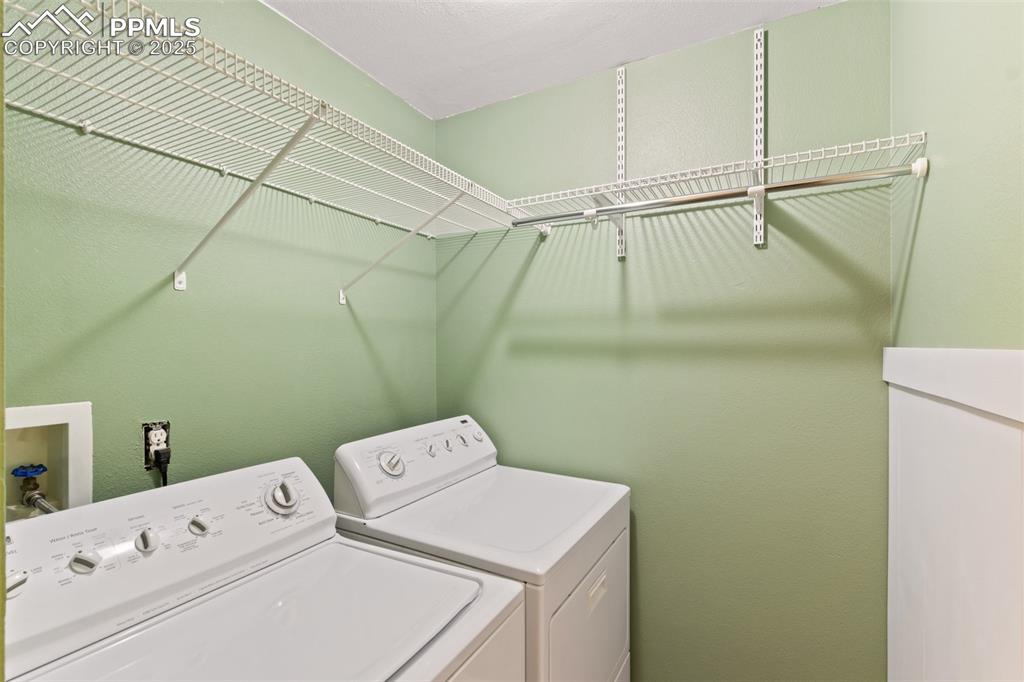 Image 17 of 44: Main level laundry with machines included.