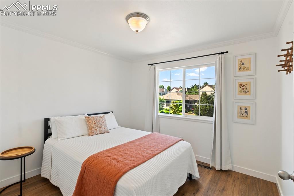 Image 21 of 44: Bedroom 2 on upper level.