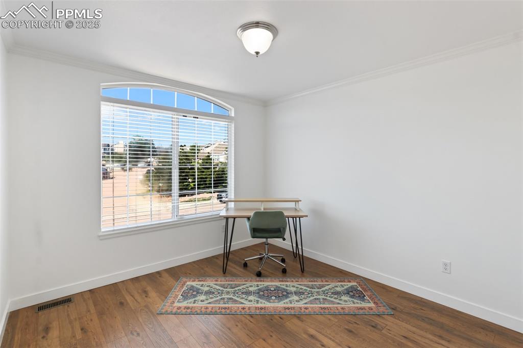 Image 24 of 44: Bedroom 3 on the upper level.