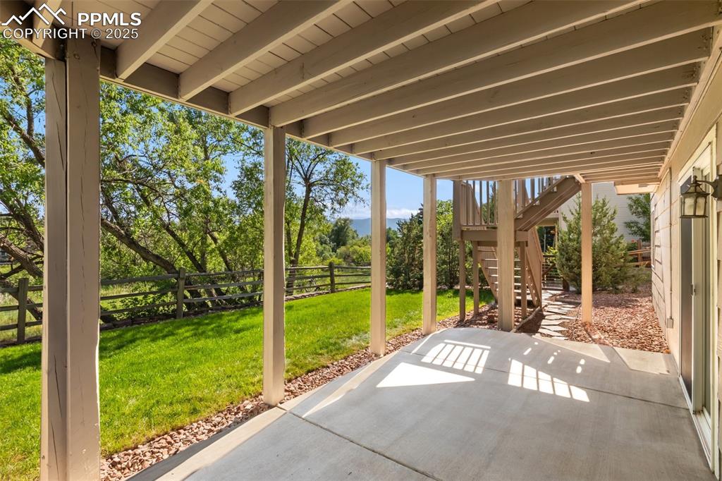 Image 35 of 44: Covered patio from walk-out basement.