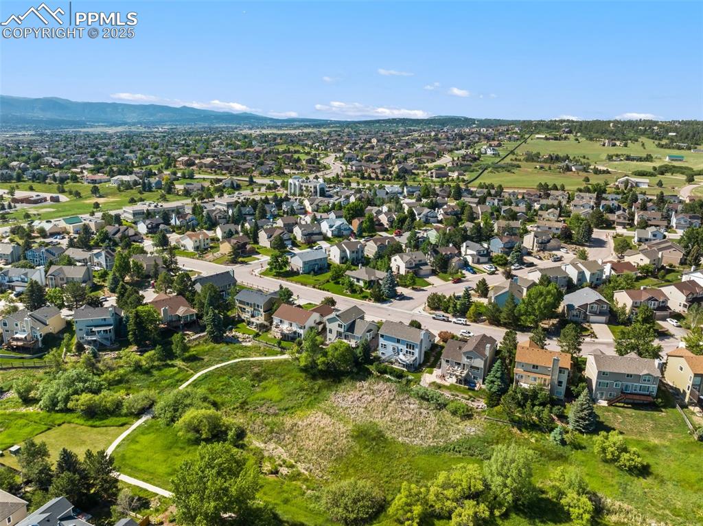 Image 41 of 44: Open space behind the house.