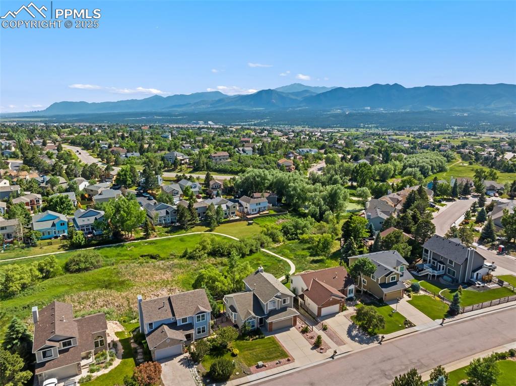 Image 43 of 44: Open space, walking trail and mountain views.