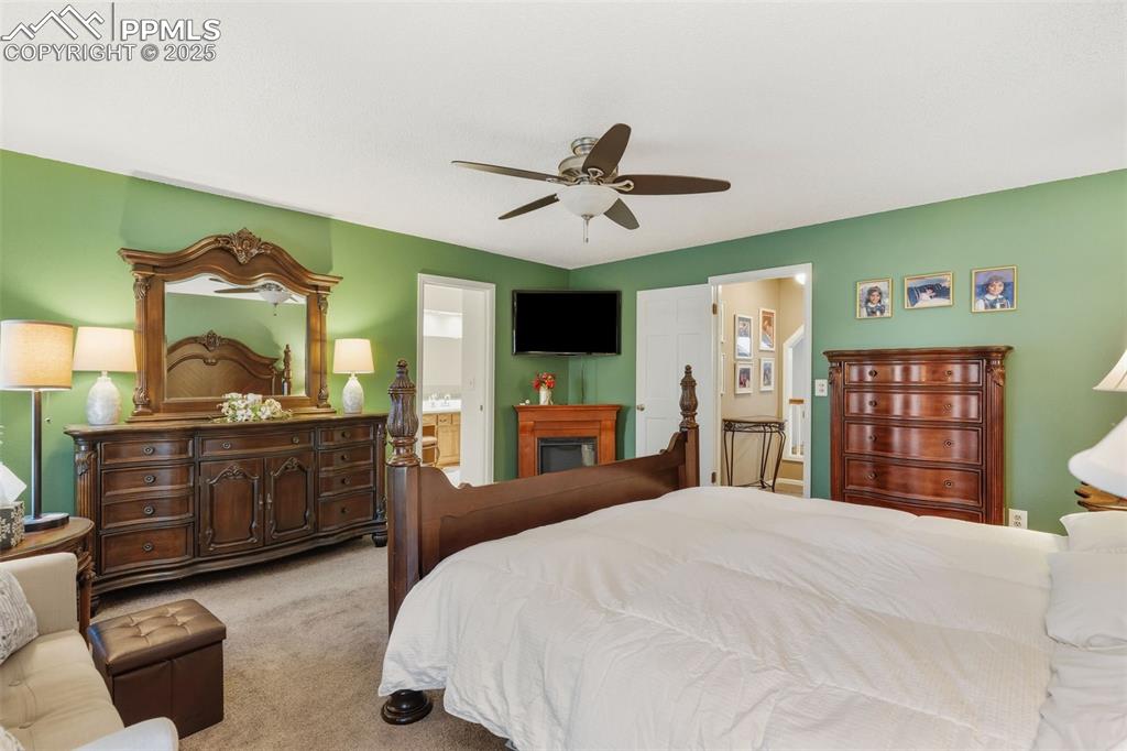 Image 14 of 35: Primary bedroom has an attached 5-piece bath and private setting as an excl