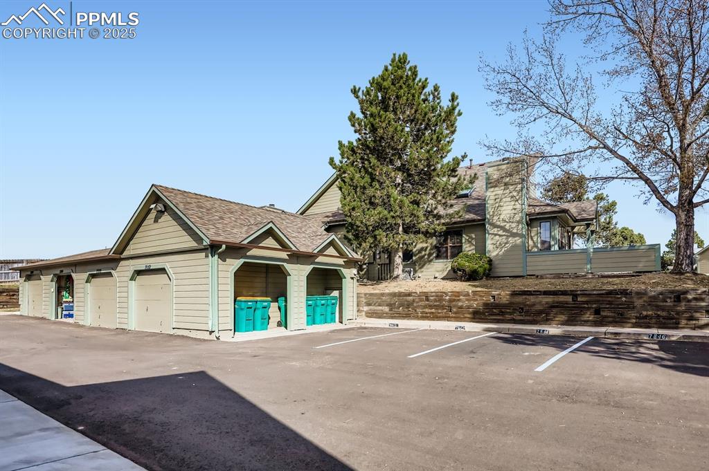 Image 25 of 25: One car garage plus additional designated parking space.