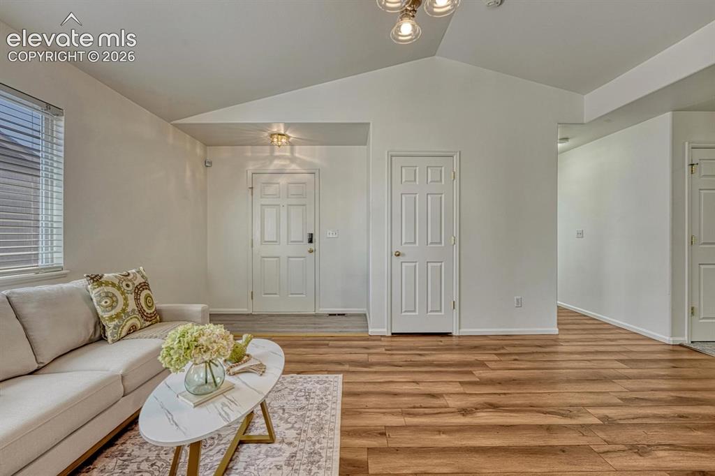 Image 13 of 35: View of the Front Entry from the Living Room.