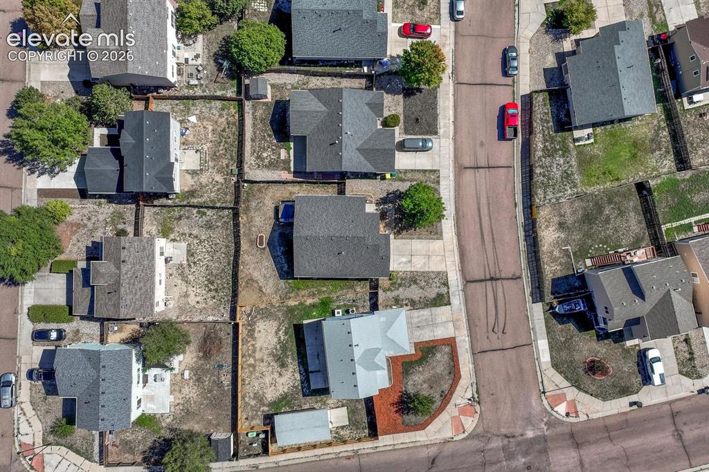 Image 31 of 35: Aerial view of home and lot.