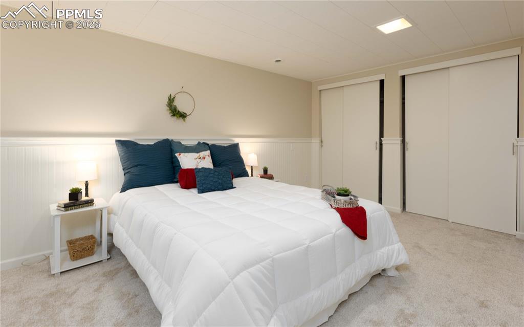 Image 14 of 29: Basement suite with lots of closet and storage space