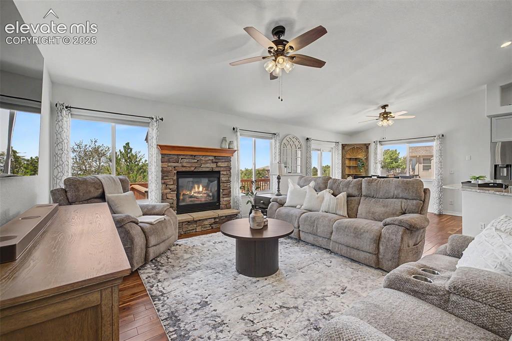 Image 12 of 43: Great Room with Beautiful Fireplace