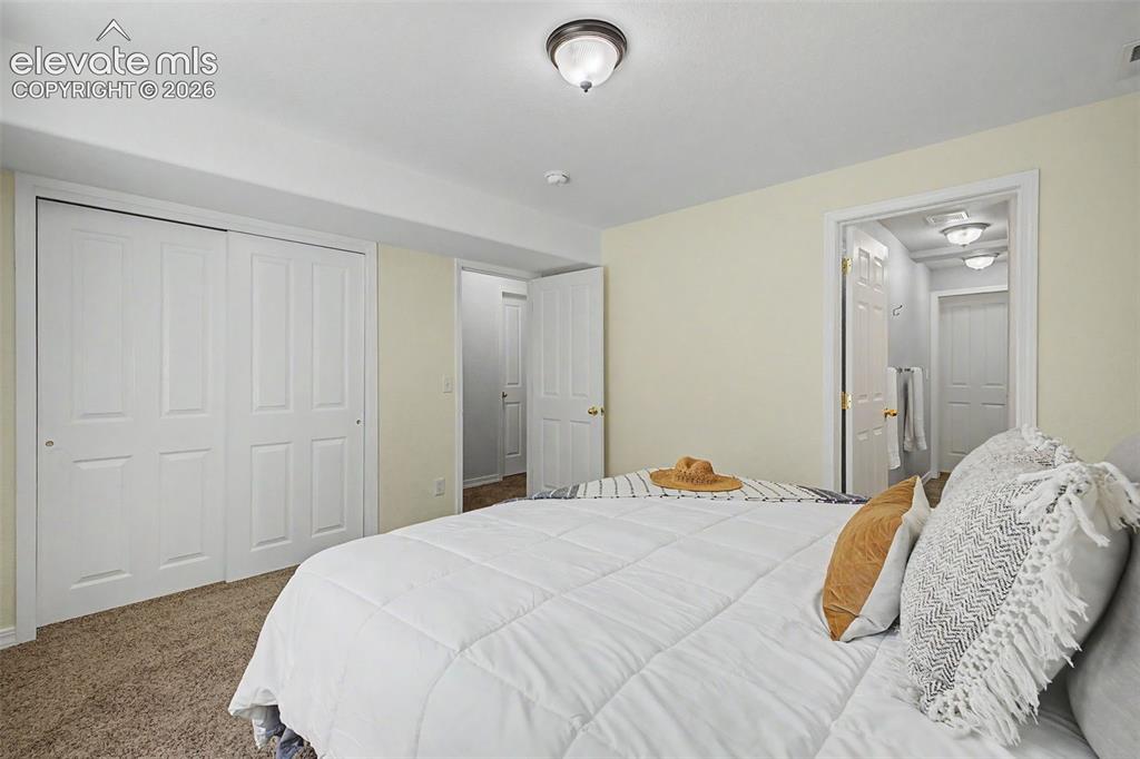 Image 31 of 43: Fourth Bedroom in Basement with Large Closet