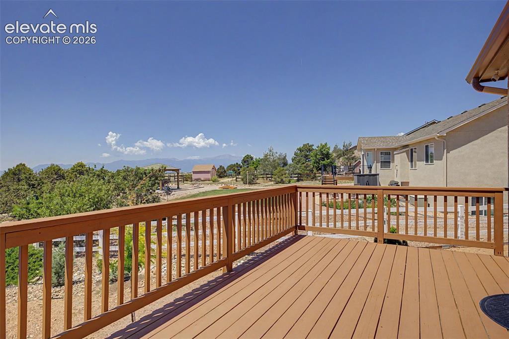 Image 33 of 43: View of Pikes Peak from Large Deck in Backyard