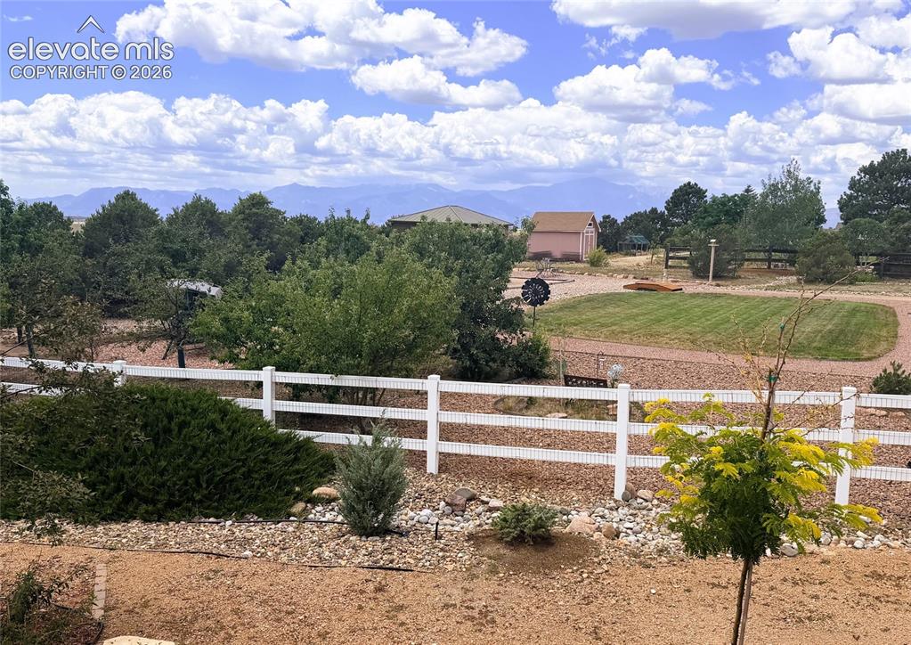 Image 36 of 43: View of Pikes Peak from Backyard