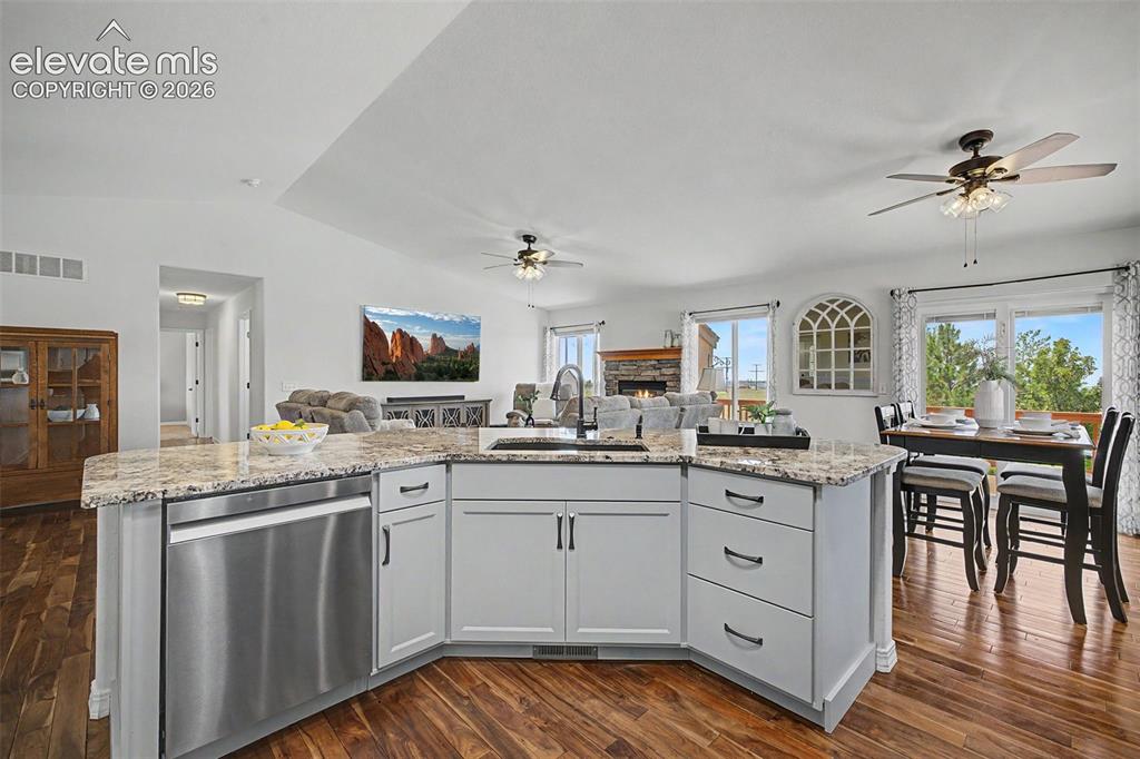 Image 5 of 43: Kitchen Opens to Dining Room & Great Room