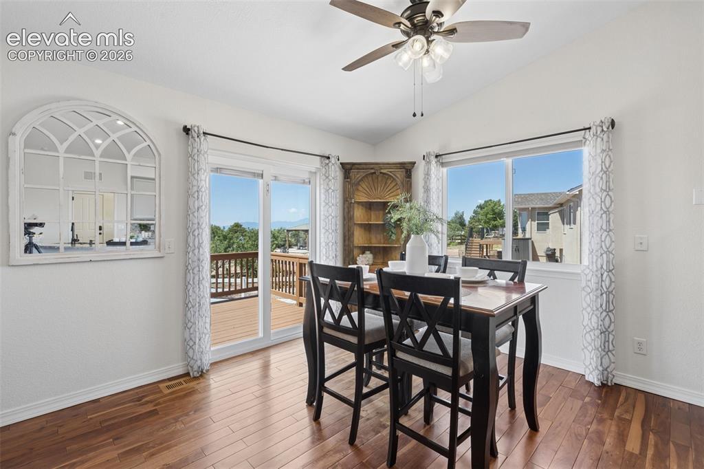 Image 8 of 43: Dining Room with Mountain Views & Ceiling Fan