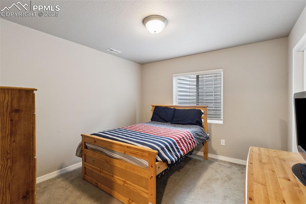 Image 30 of 37: Bedroom