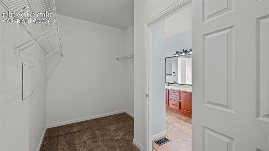 Image 22 of 37: Walk-In Closets