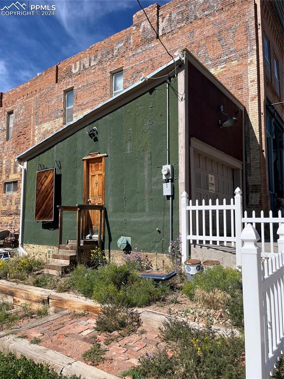 Image 7 of 12: View of front of house