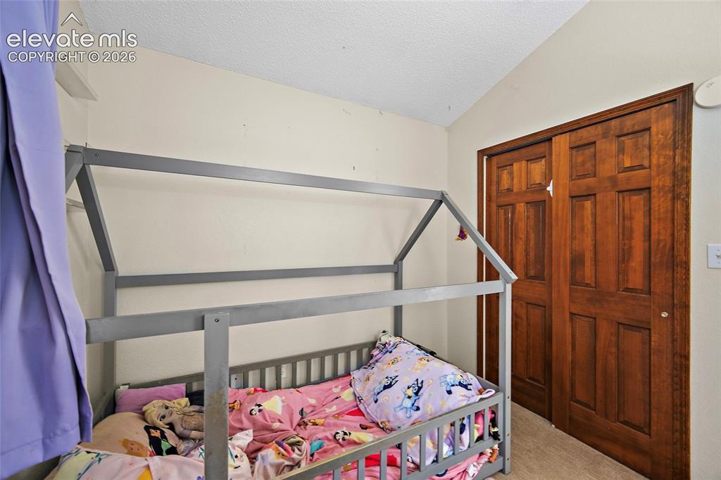 Image 18 of 28: Bedroom