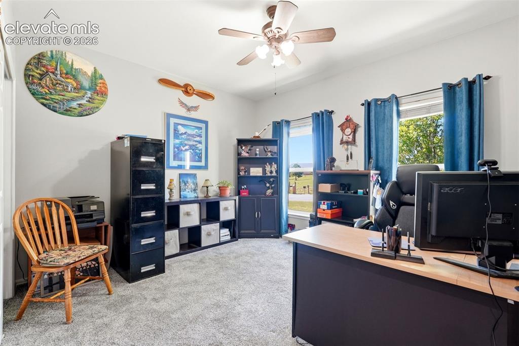 Image 21 of 48: Main level bedroom (#2)-currently used for an office