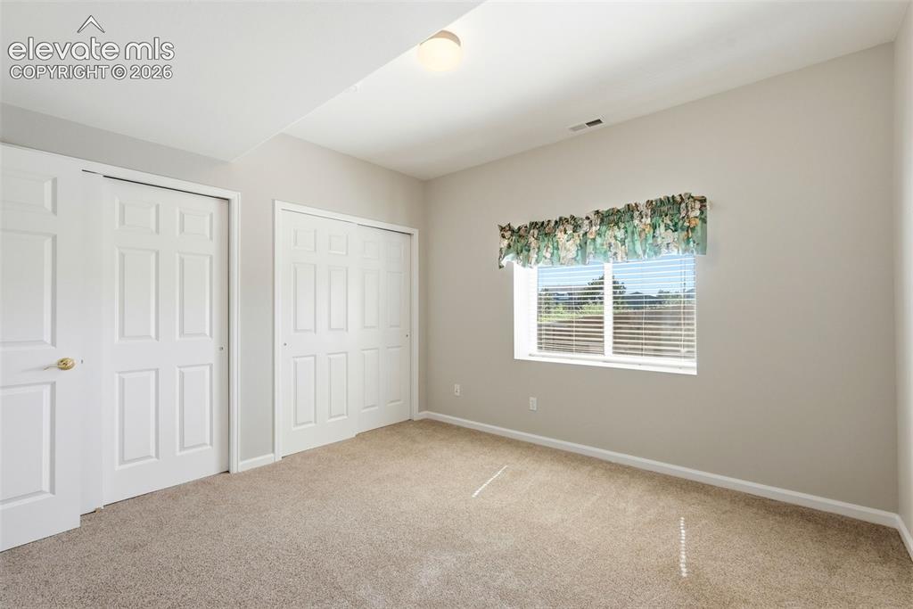 Image 32 of 48: Basement bedroom (#4)