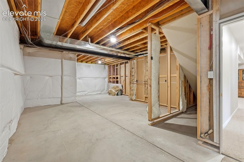 Image 34 of 48: LARGE basement storage room