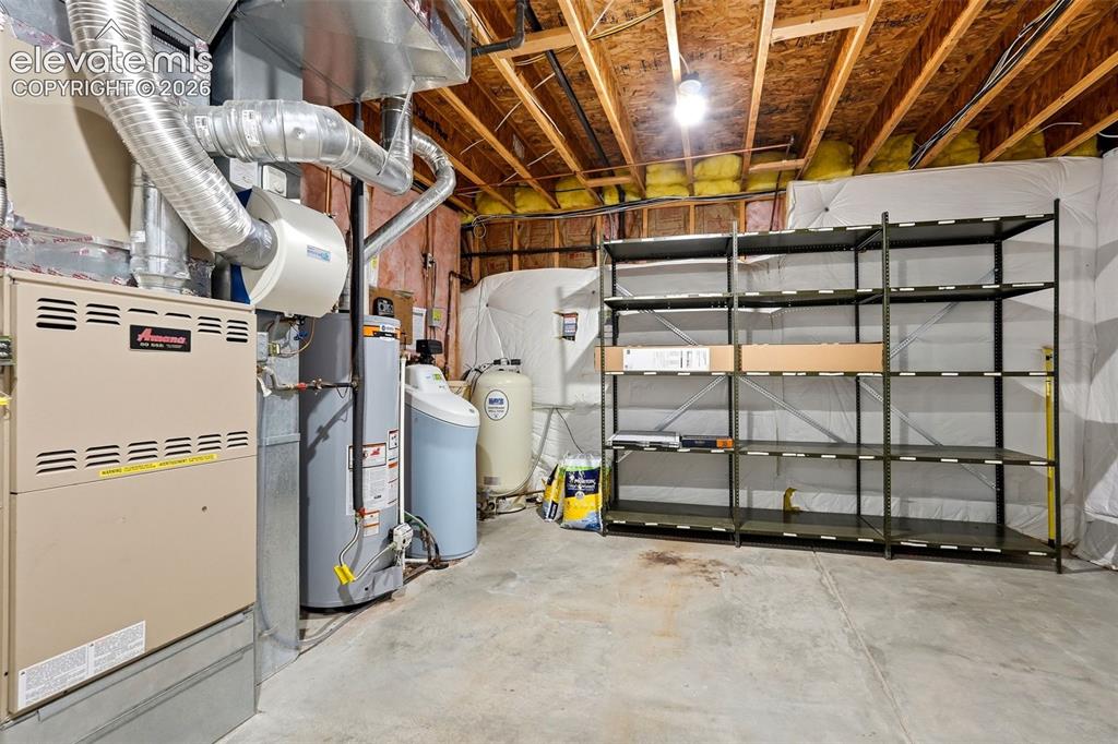 Image 35 of 48: Basement utility/storage room