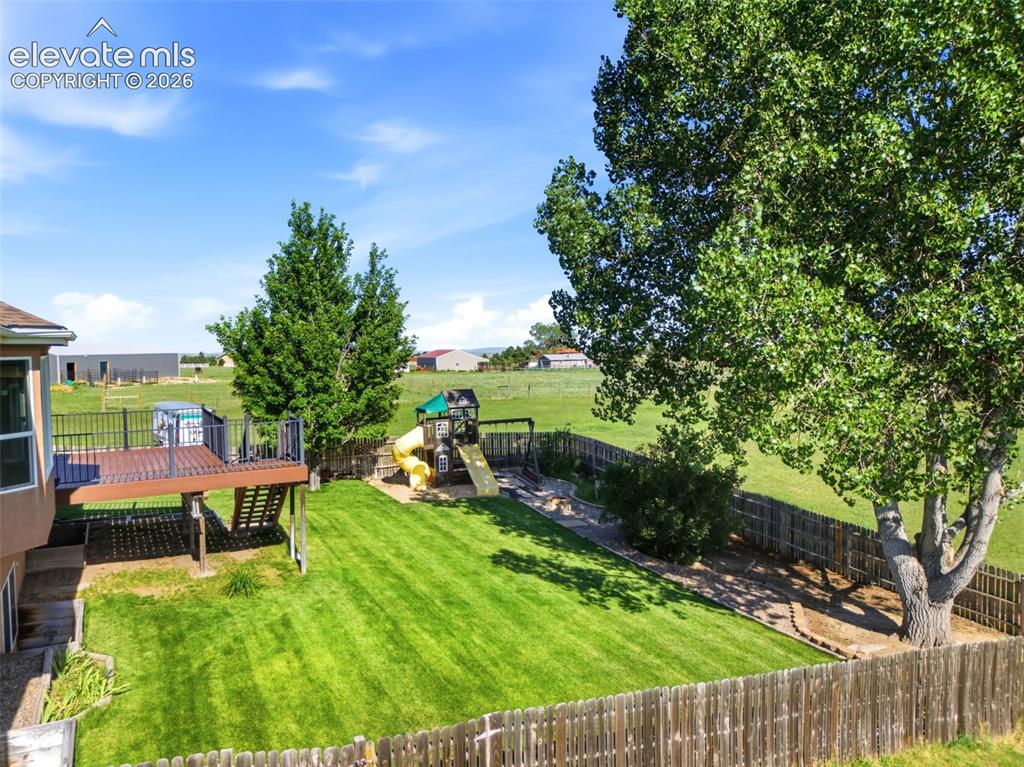 Image 40 of 48: Garden area is just behind the trees with water access too!