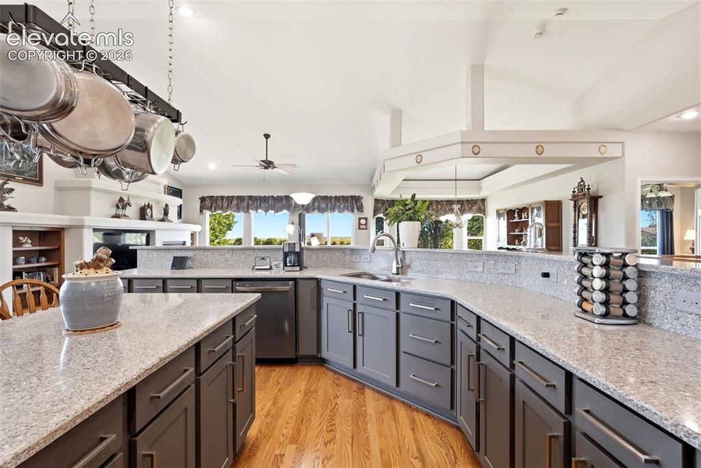 Image 7 of 48: Quartz counters & soft close cabinetry/drawers