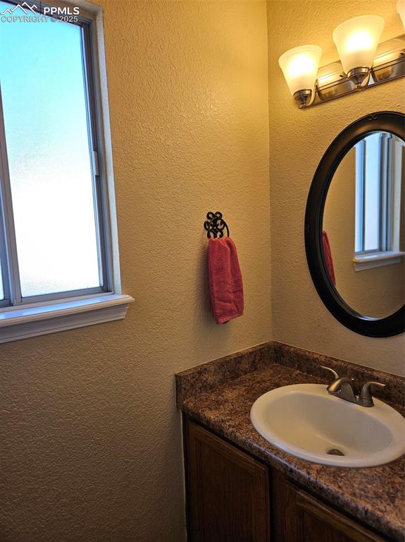 Image 10 of 27: Half bath main level