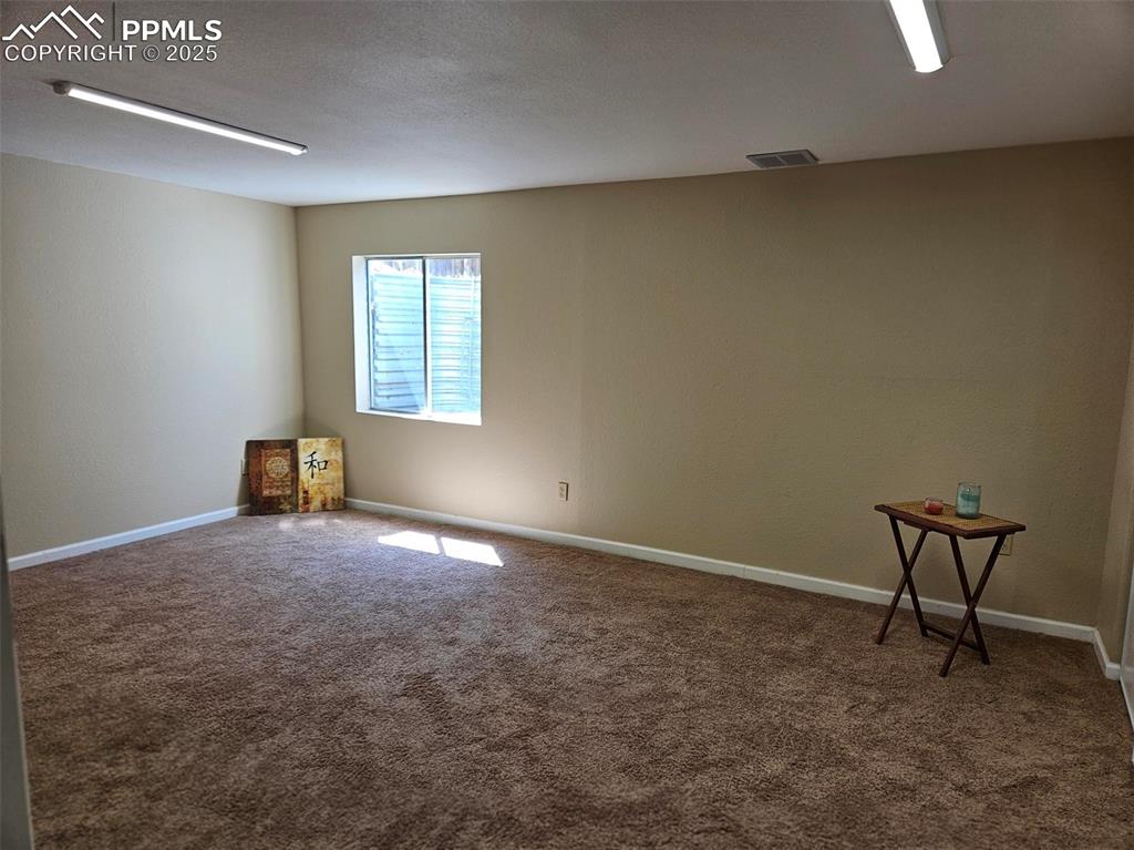 Image 16 of 27: Basement Family Room