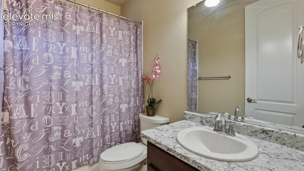 Image 14 of 50: Full Bathroom with vanity, mirror, and tub/shower.